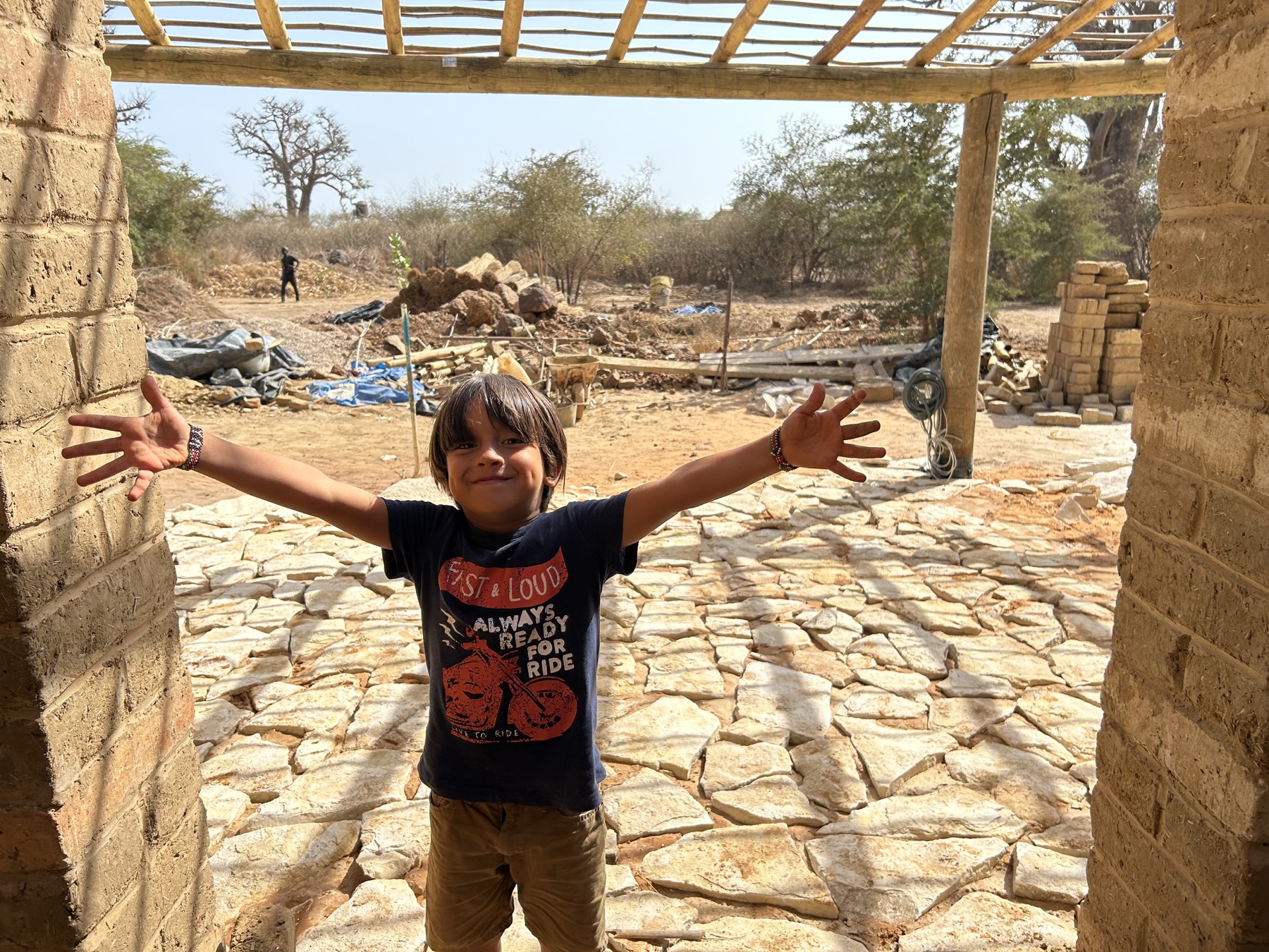 A child on the stone terrace